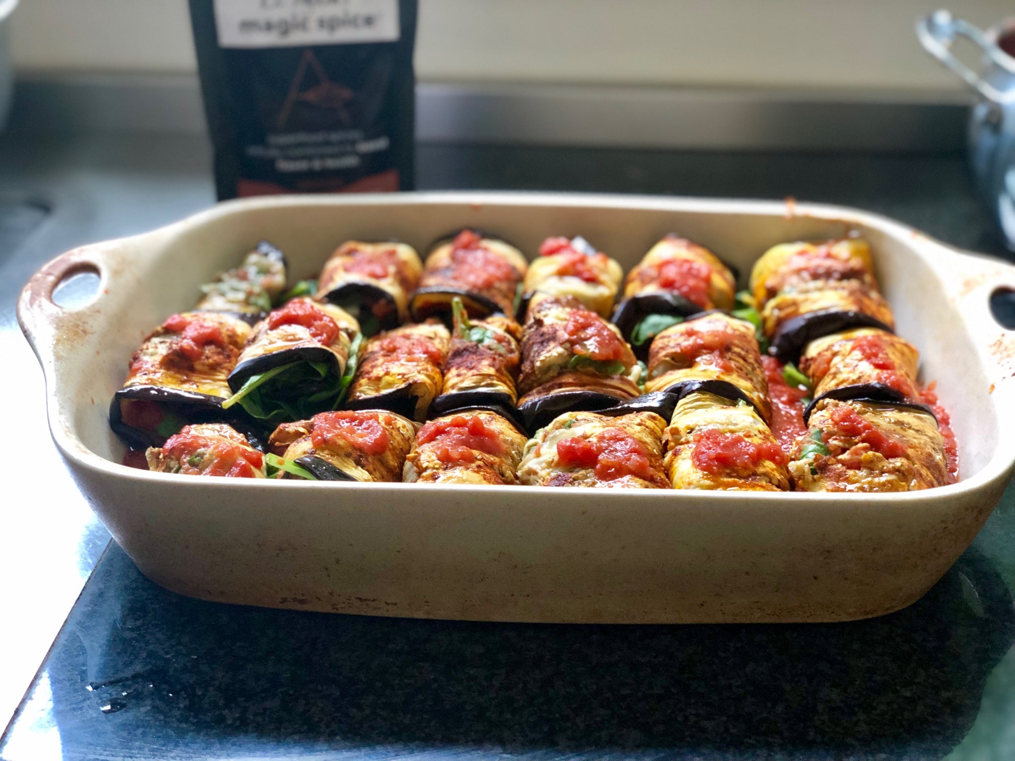 Feta and Collard Greens Stuffed Eggplants in Tomato and Red Lentil Sauce